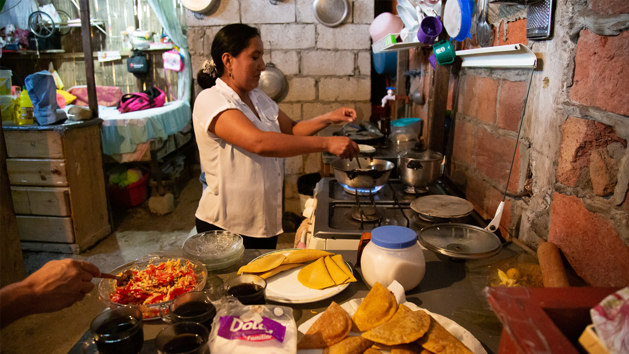 See the after math of cooking up empanadas with this family! Look around and see where this family runs their well known empanada business. You'll see delicious homemade empanadas, their kitchen, Unbound mothers, staff and sponsored kids!